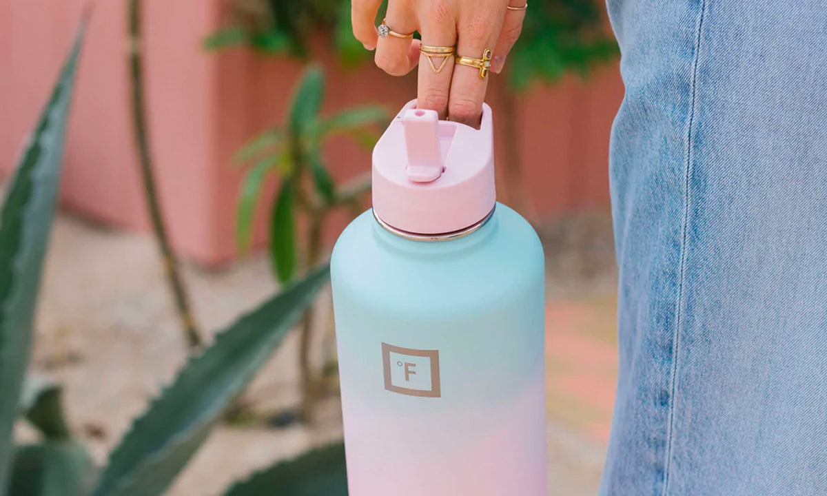 Woman Carrying an Iron Flask Water Bottle